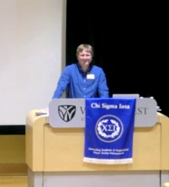 Dr. Ivers speaking at CSI Induction Ceremony after being presented with the plaque commemorating the new scholarship in his honor on May 2, 2025.