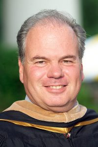 John Medica in his commencement robes