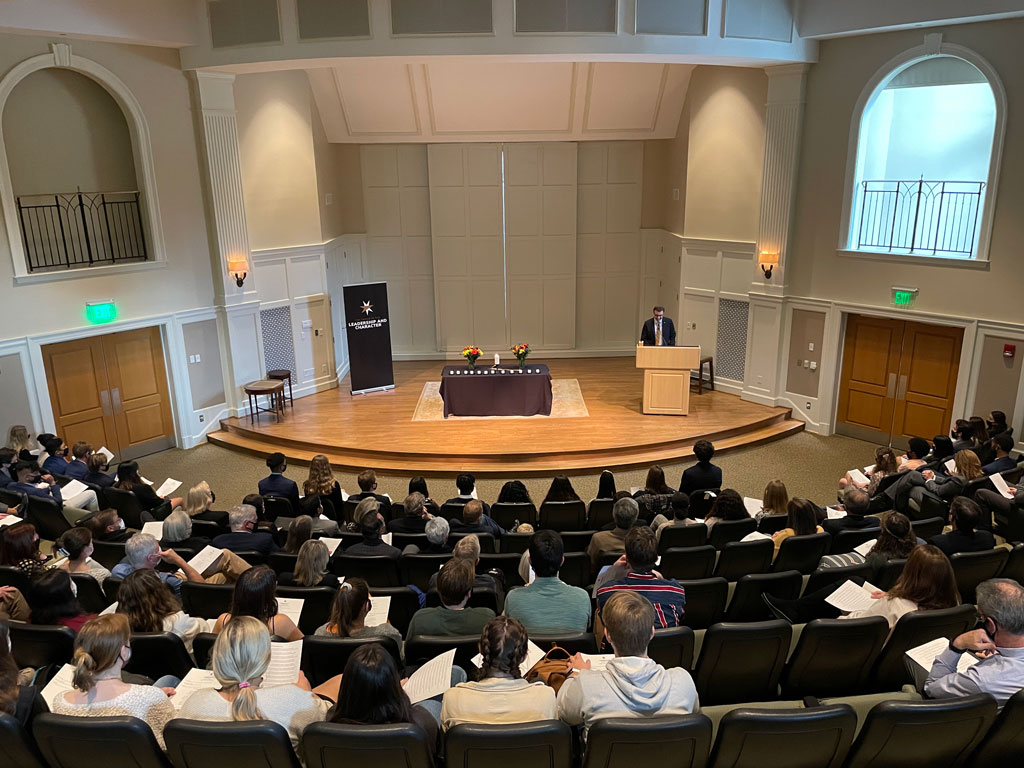 wide shot of initiation ceremony