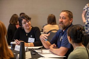Grantees have a discussion at a convening.