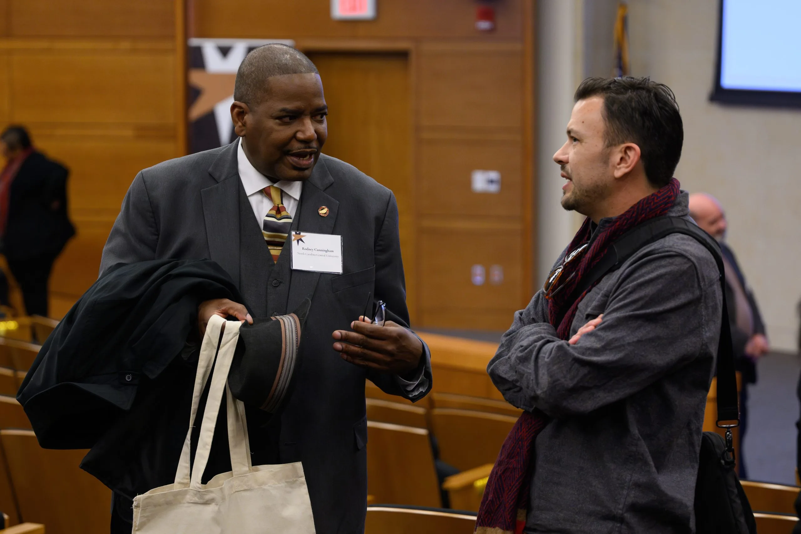 conference participants chat between sessions