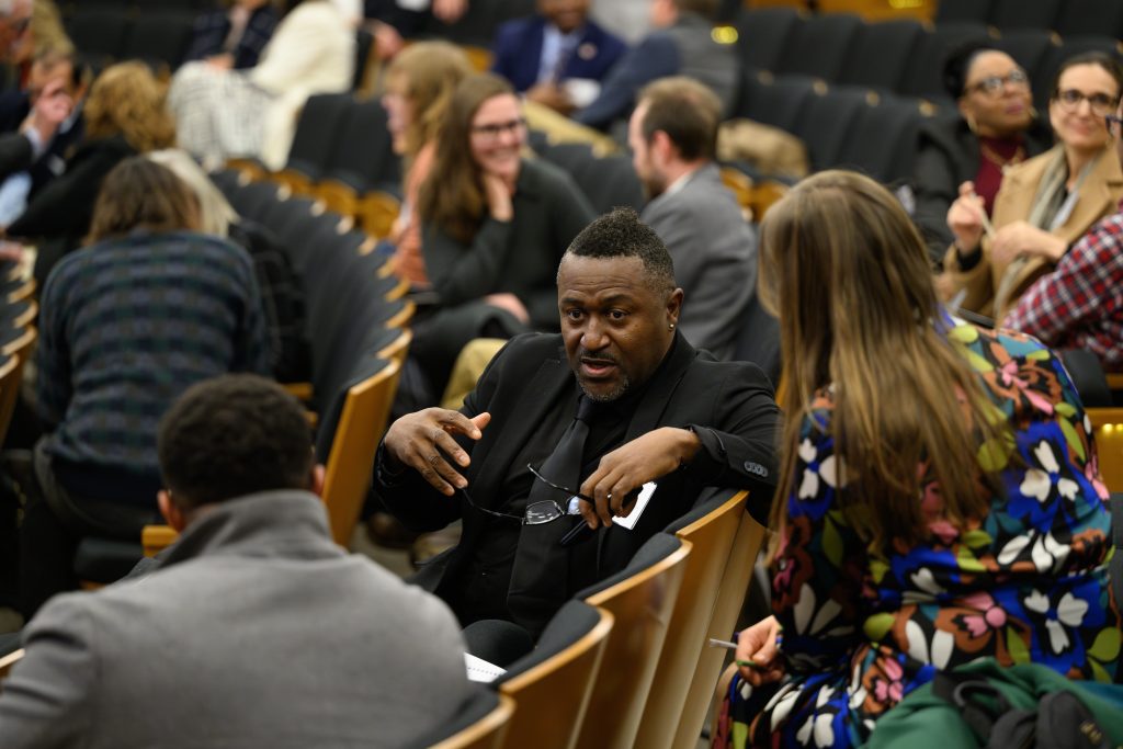 conference participants chat between sessions