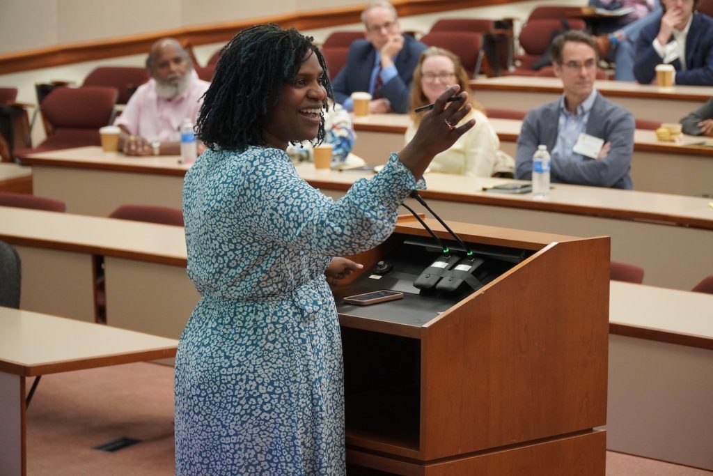 Woman speaking at Law Conference