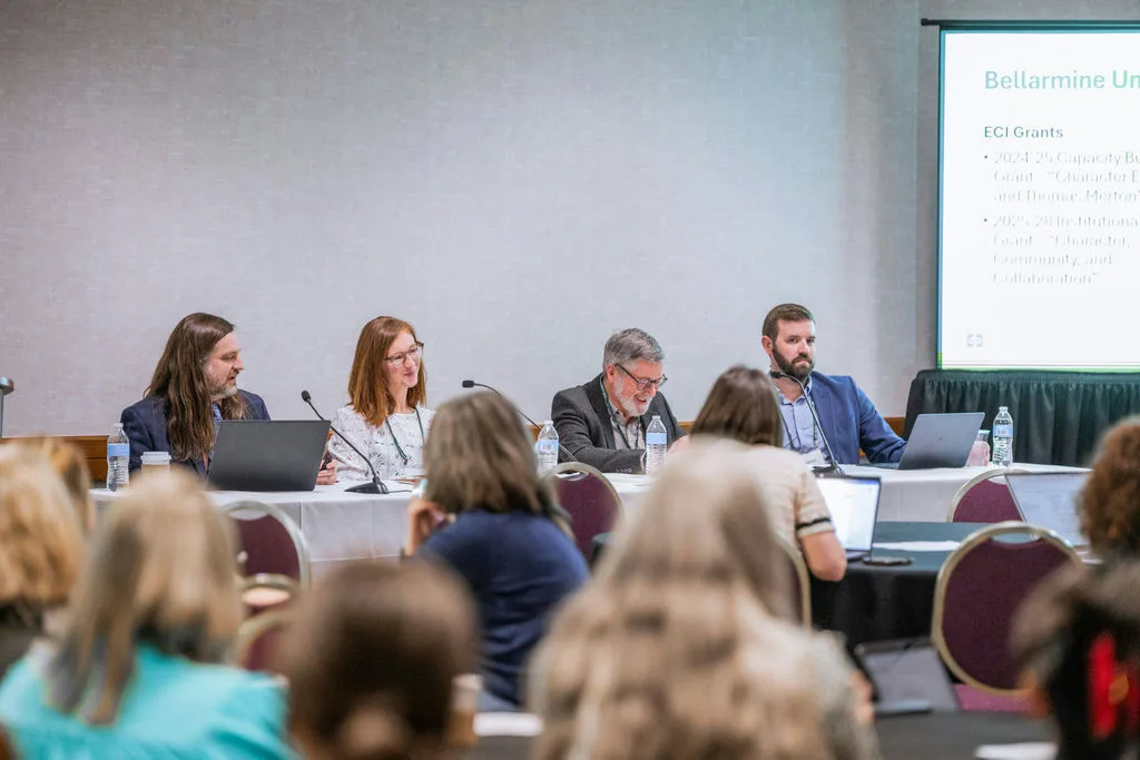 four faculty members speak on a panel