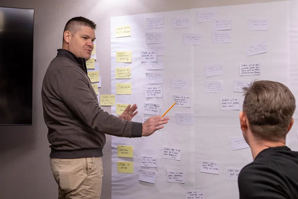 Michael Hahn in front of whiteboard