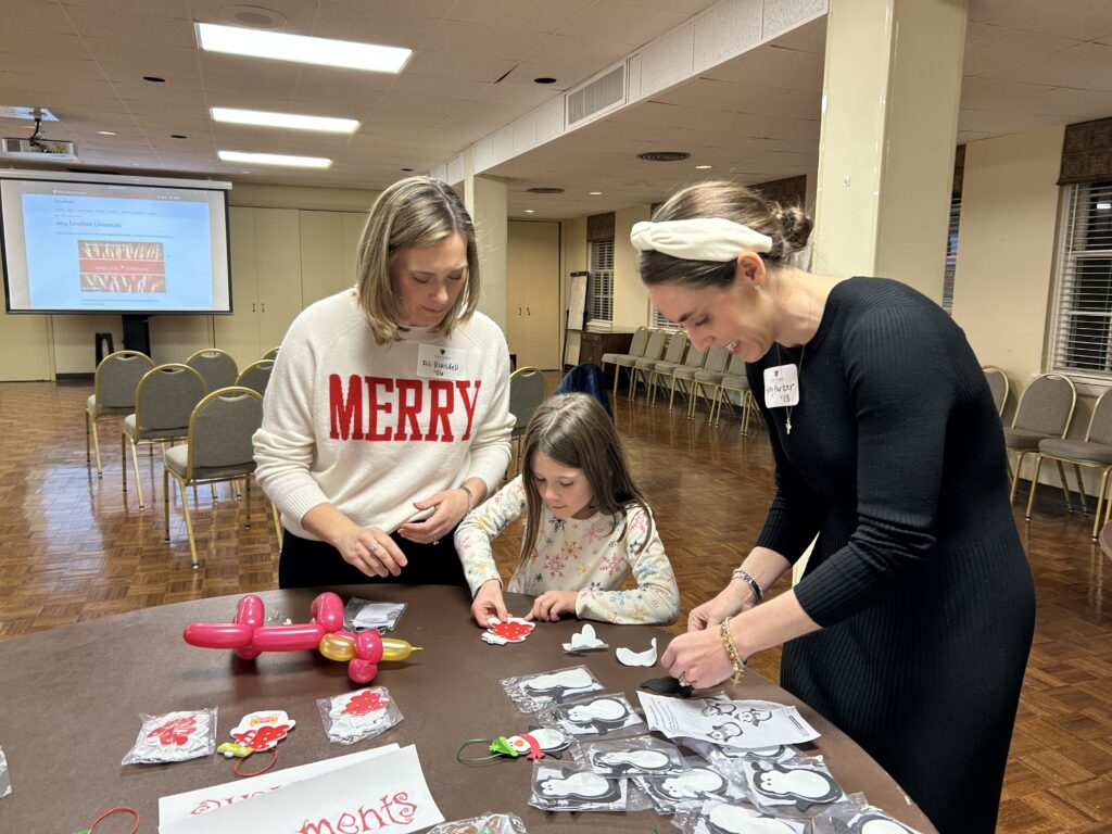 Guests at the WAKEAtlanta Lovefeast gathering enjoy making ornament crafts before the livestream viewing.