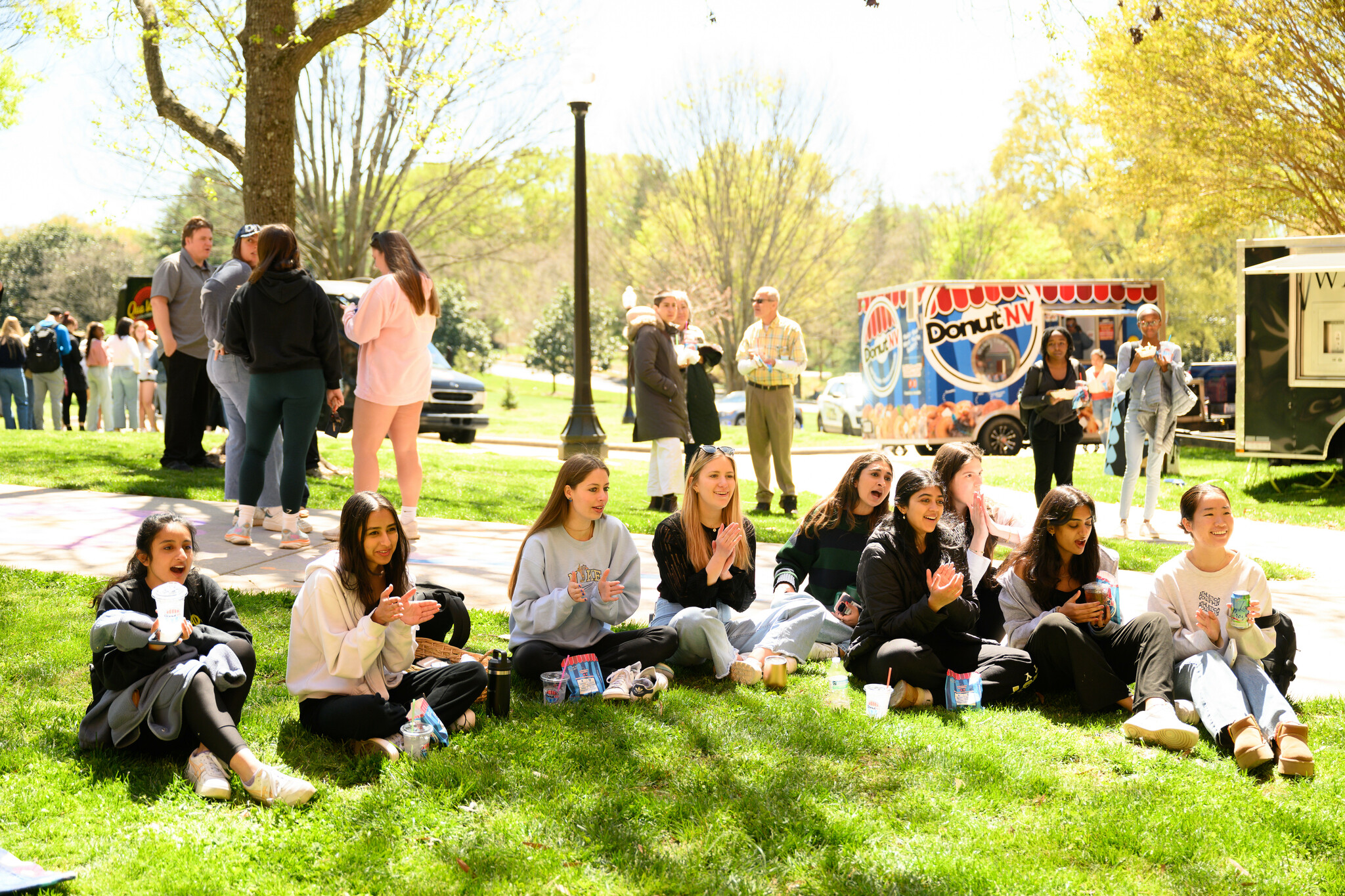 Students, faculty, staff, and community members attend the second annual Wakeville, a student-led, interdisciplinary arts festival on Saturday, April 6,2024 at Scales Fine Arts Center at Wake Forest University. Wakeville had many creative offerings in and around Scales Fine Arts Center and Davis Field, including music, dance, theater, visual art, film, comedy and more. The WFU Choirs perform on the stage at Brendle Recital Hall.