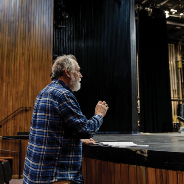 Director Michael Kamtman gives suggestions to his actors during rehearsals.