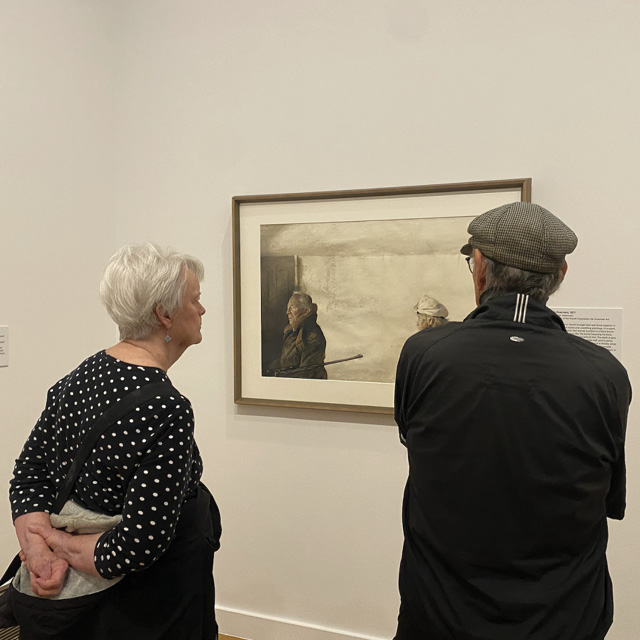 A couple contemplating “The Kuerners” (1971) at the Reynolda House Museum of American Art.