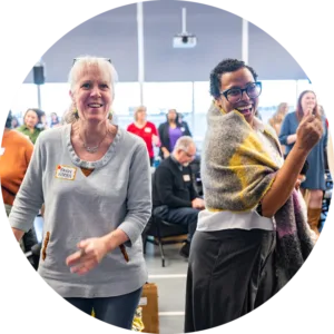 Attendees dance and move together