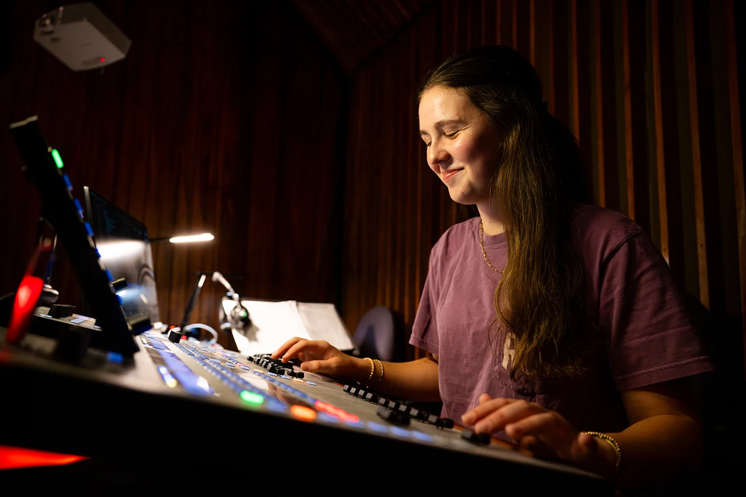 Student at sound board.