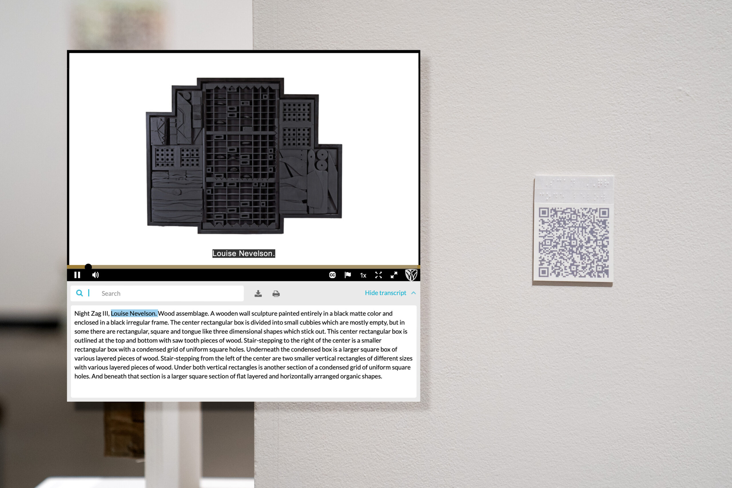 QR code on wall with website screenshot overlayed displaying an audio file and transcript