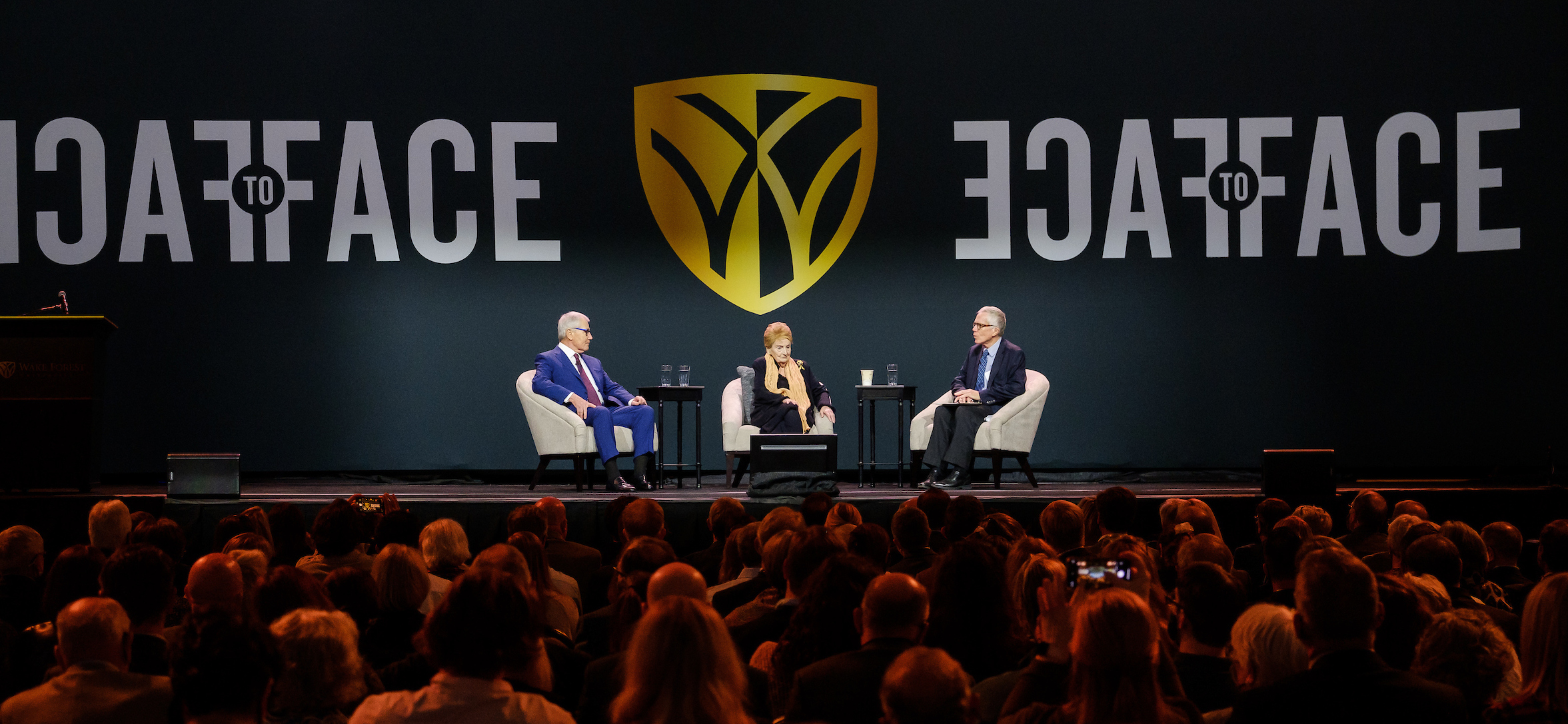 Former Secretary of State Madeleine Albright and former Secretary of Defense Chuck Hagel talk with journalist Paul Richter at the Face to Face speaker series in Joel Coliseum, on the campus of Wake Forest University on Tuesday, November 9, 2021.