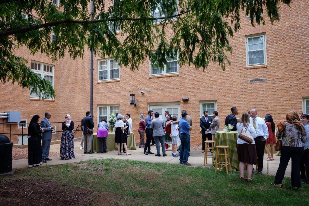 Image of people gathered outside Muslim Students Lounge at the dedication ceremony.