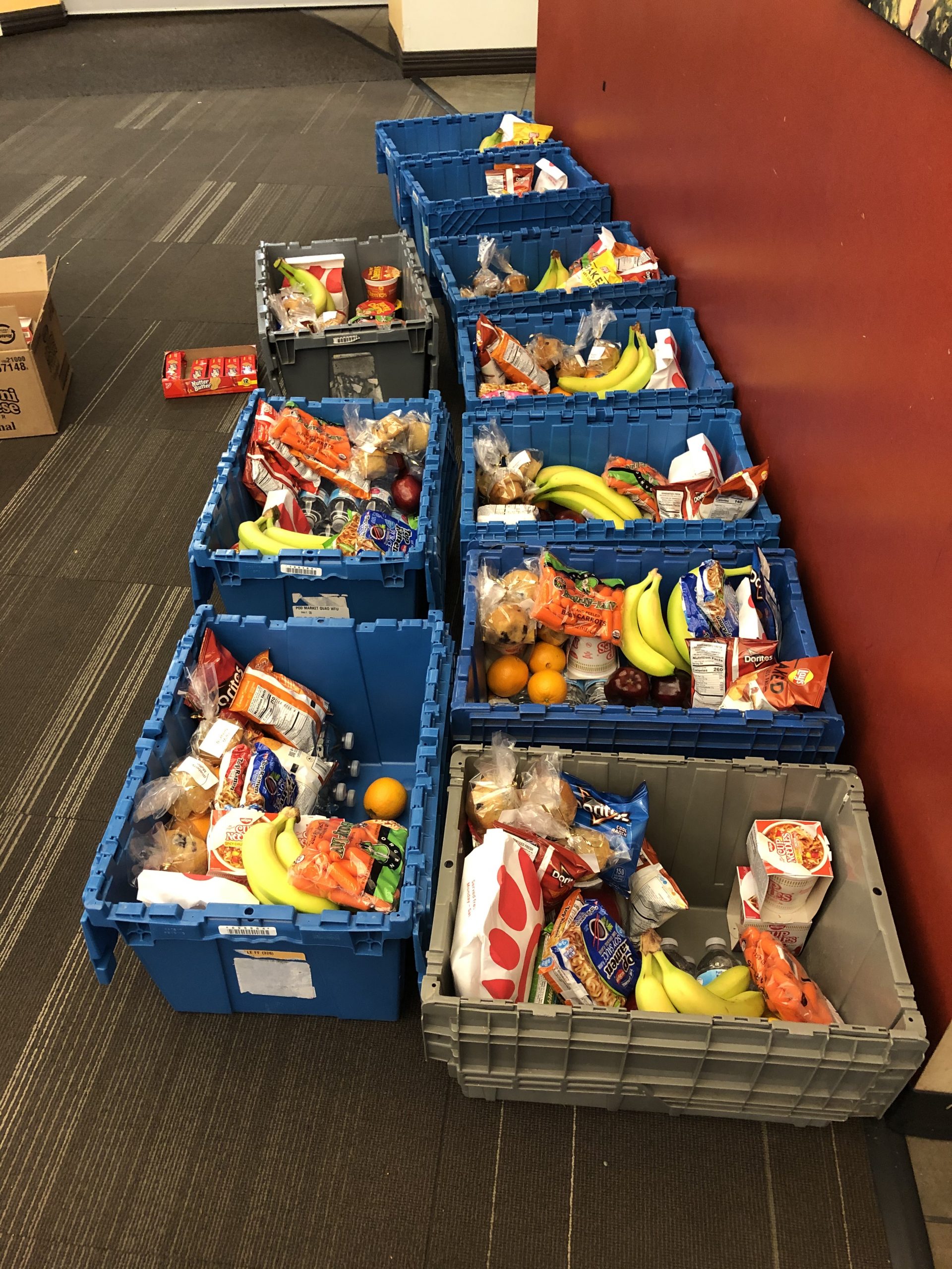 336 Market grocery delivery containers filled with various grocery items.