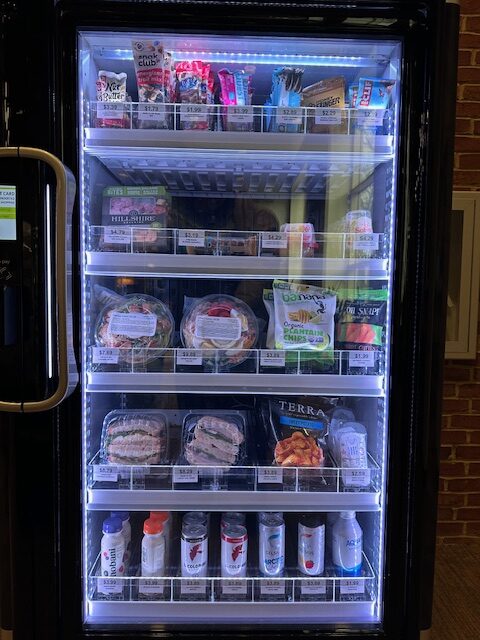 Photo of available food and beverage options in the new Deacs Recharge Smart Vending Machine located in the Wellbeing Center on campus. 
