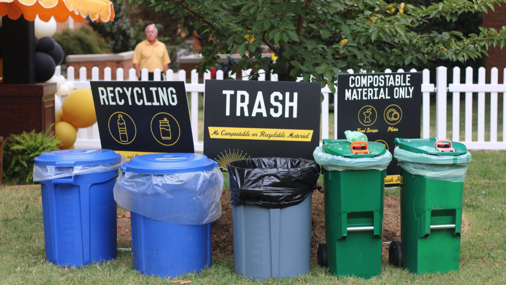 Compost, recycling and trash bins set up for Homecoming activities in 2024.