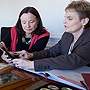 Examining letters at a table