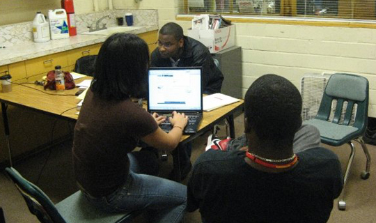 People sitting around a desk