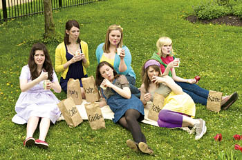 group of women eating in a park