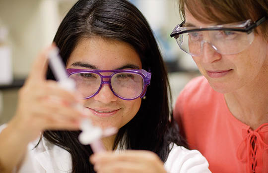 Student and professor in lab