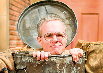 Russell Shilling in Oscar the Grouch's trash can.