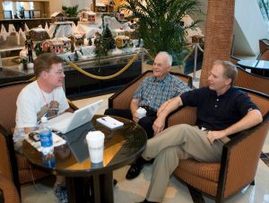 Kerry King talks with Ken Carlson Jr. and Ken Carlson Sr.