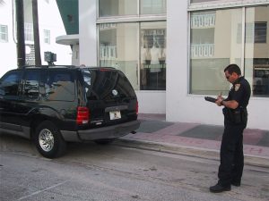 Policeman writing a ticket