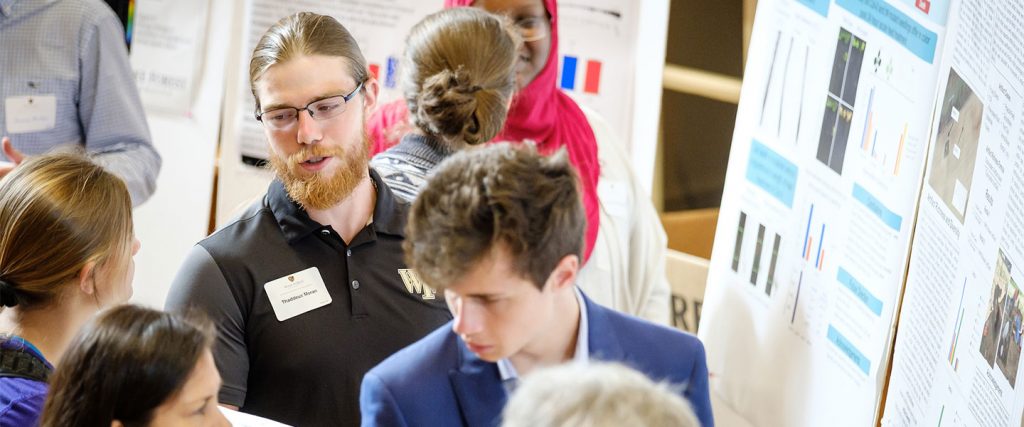 Wake Forest students show the results of their research projects during Undergraduate Research Day