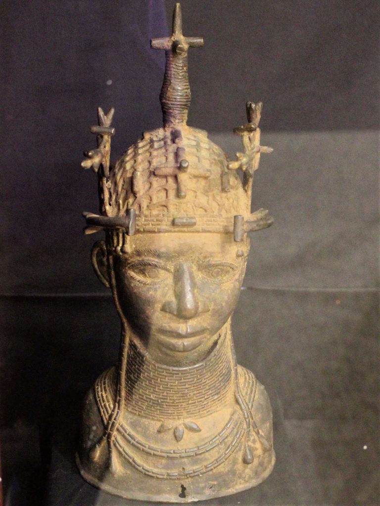 Brass head figure