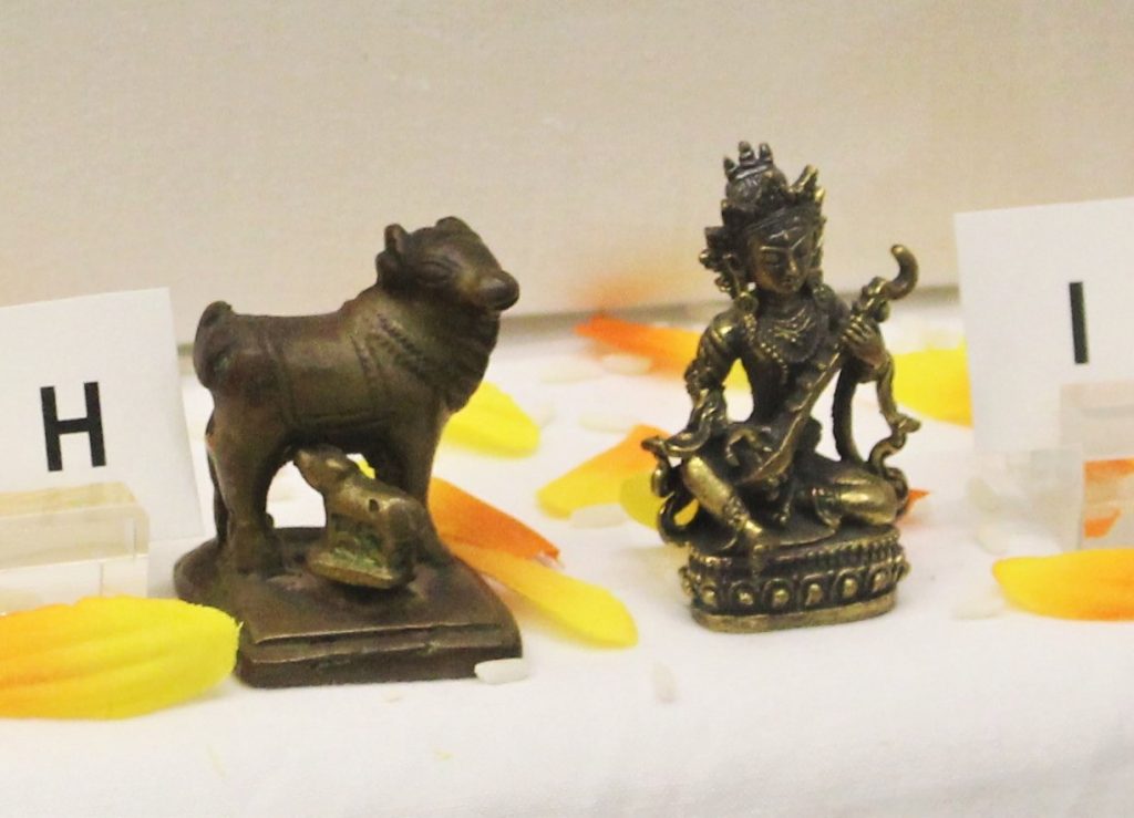 kamadhenu sculpture and saraswati sculpture
