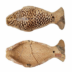 tea grater in the shape of a fish