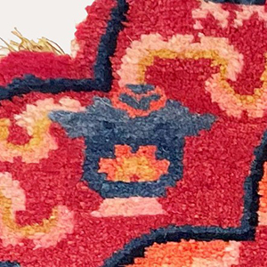 Vase detail of rug