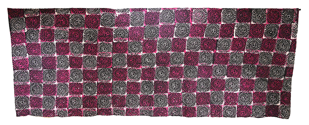 Pink, white and black stamped fabric