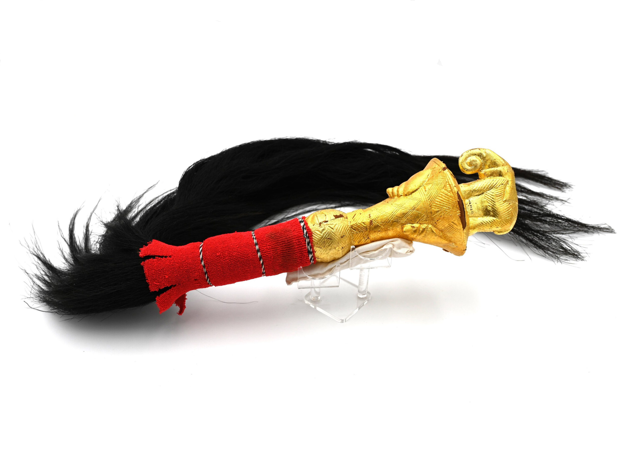 fly whisk with gold handle and long black whisk