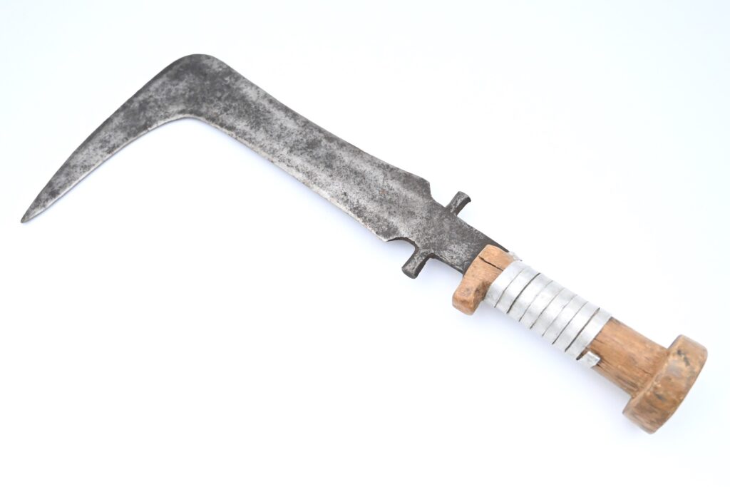 L-shaped knife with a wooden handle