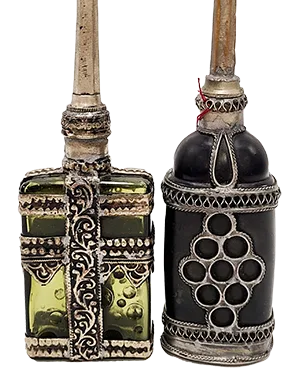glass bottles with metal decoration