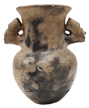 ceramic pot with faces on two sides