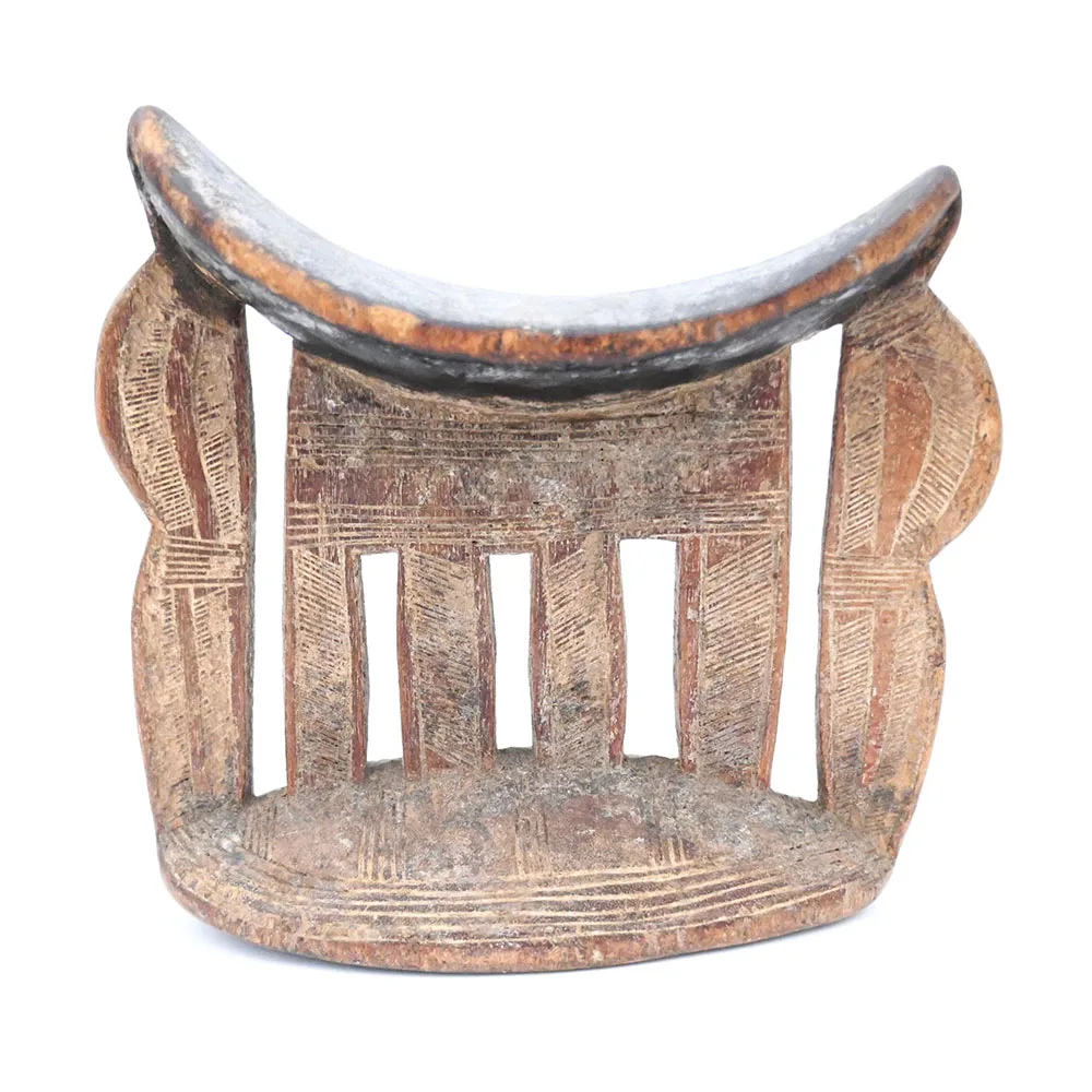 wooden headrest with 6 vertical supports connected to base