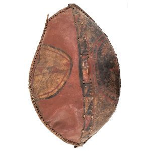 oval shaped shield with black and red designs