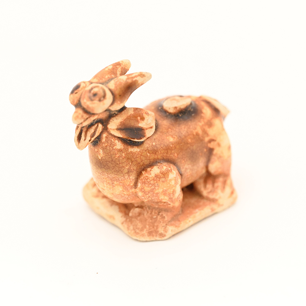 Miniature ceramic figure of a goat