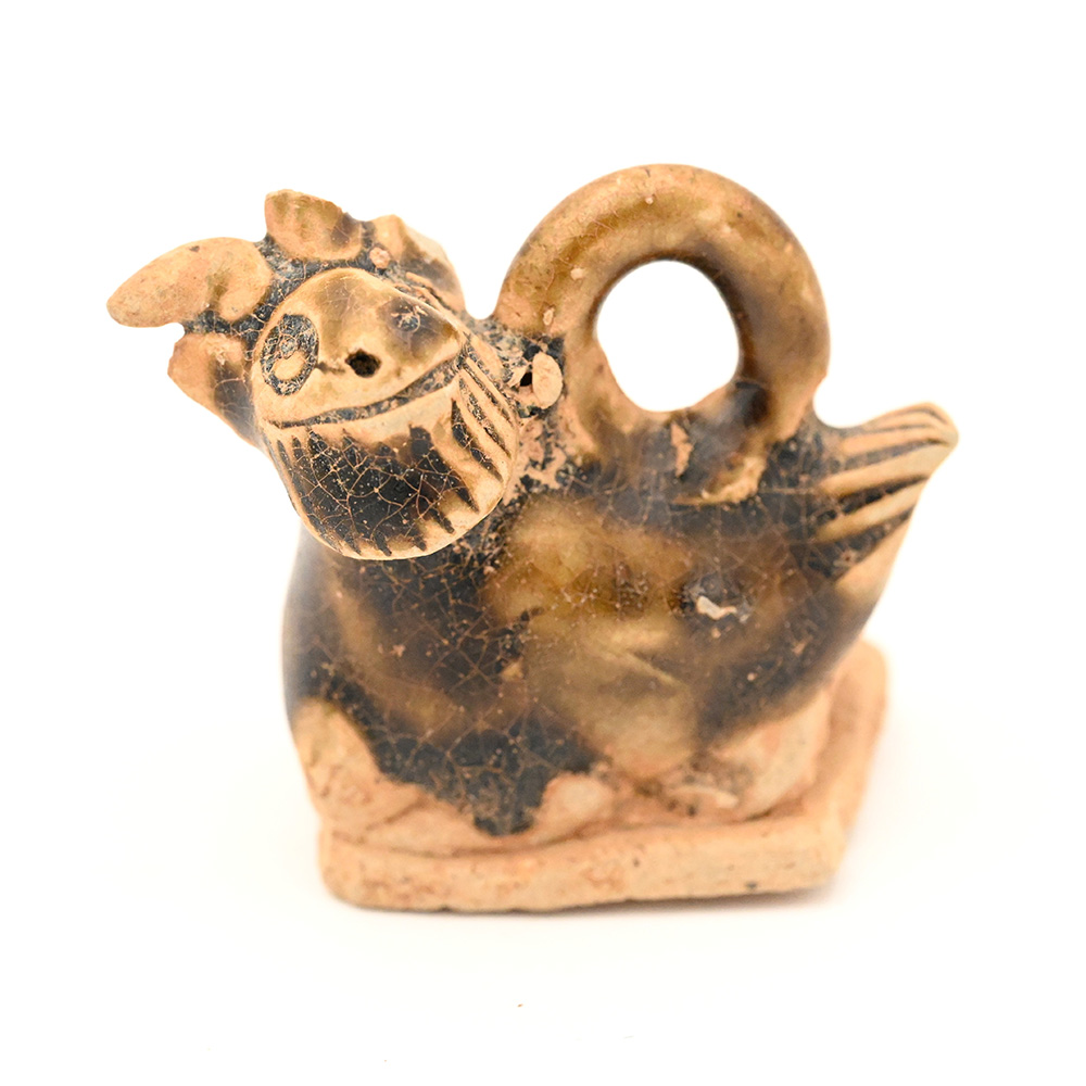 Miniature ceramic figure of a goat
