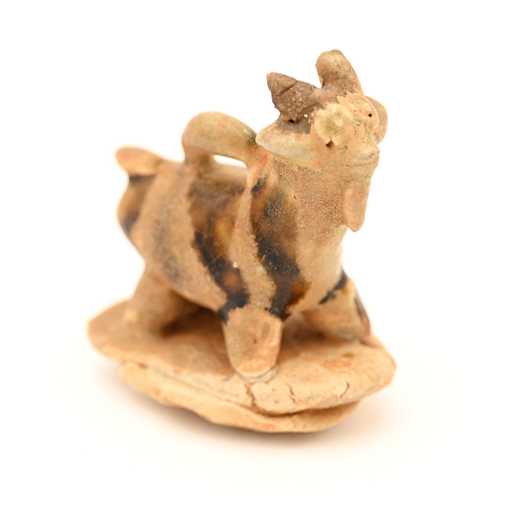 Miniature ceramic figure of a goat
