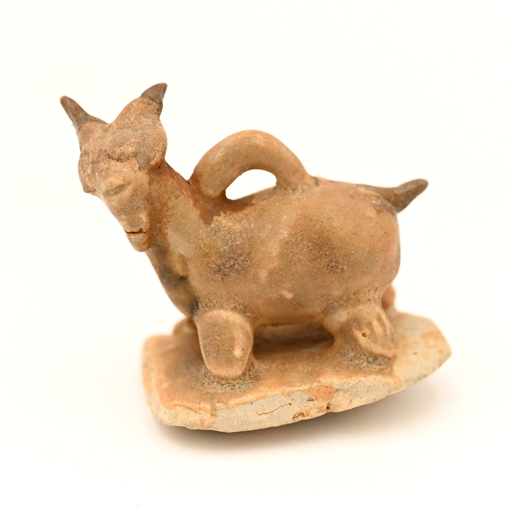 Miniature ceramic figure of a goat