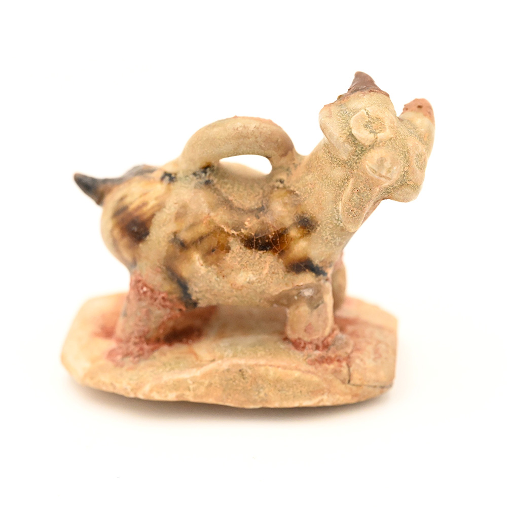 Miniature ceramic figure of a goat