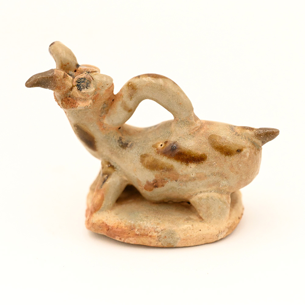Miniature ceramic figure of a goat