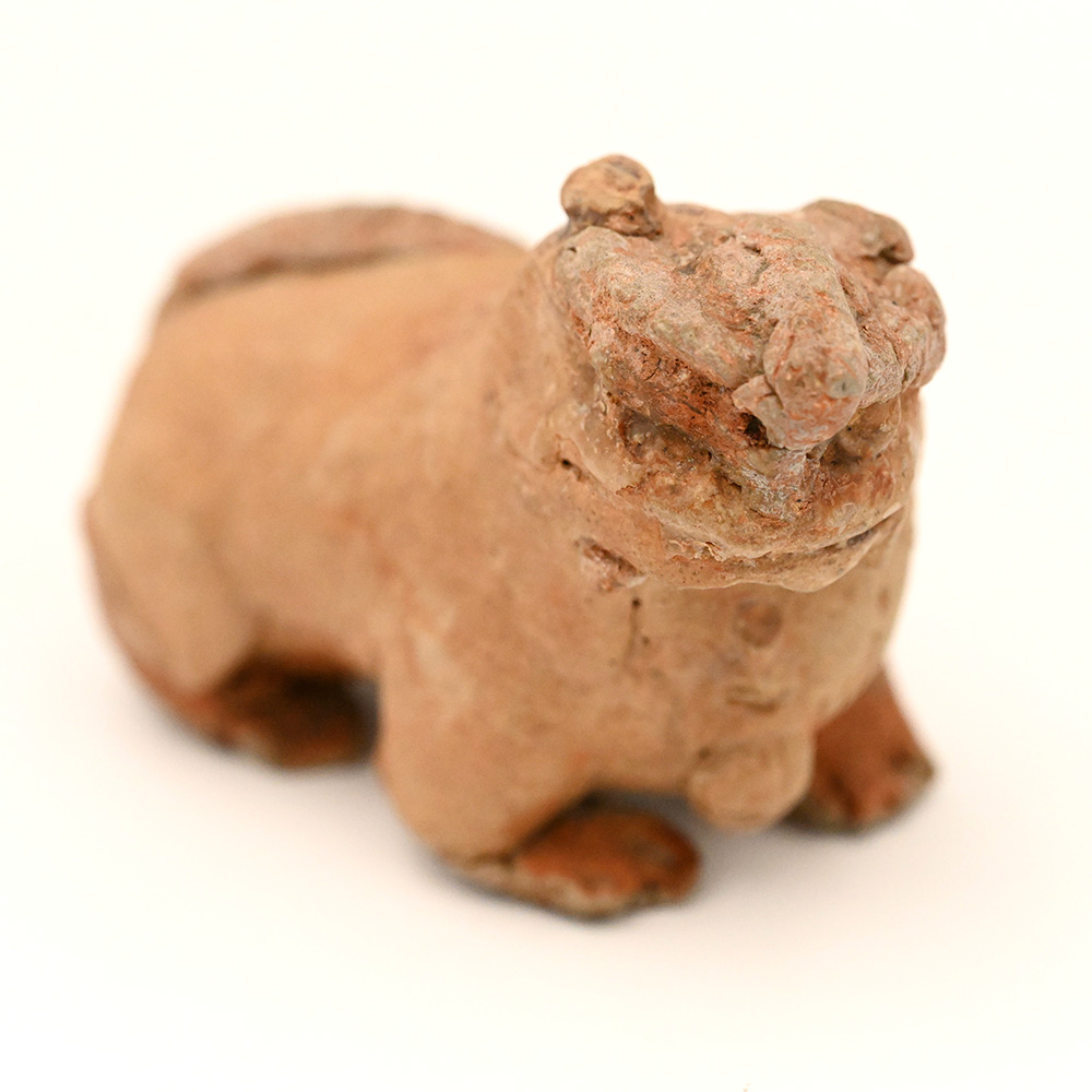 miniature ceramic figure of a lion dog