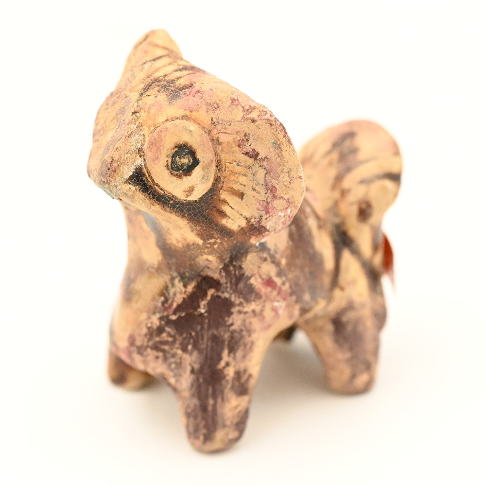 miniature ceramic figure of a lion dog