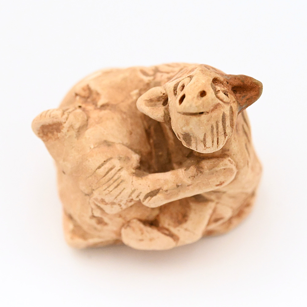 miniature ceramic figure of a goat