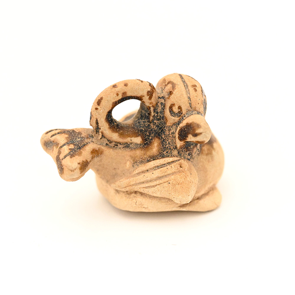 miniature ceramic figure of a bird